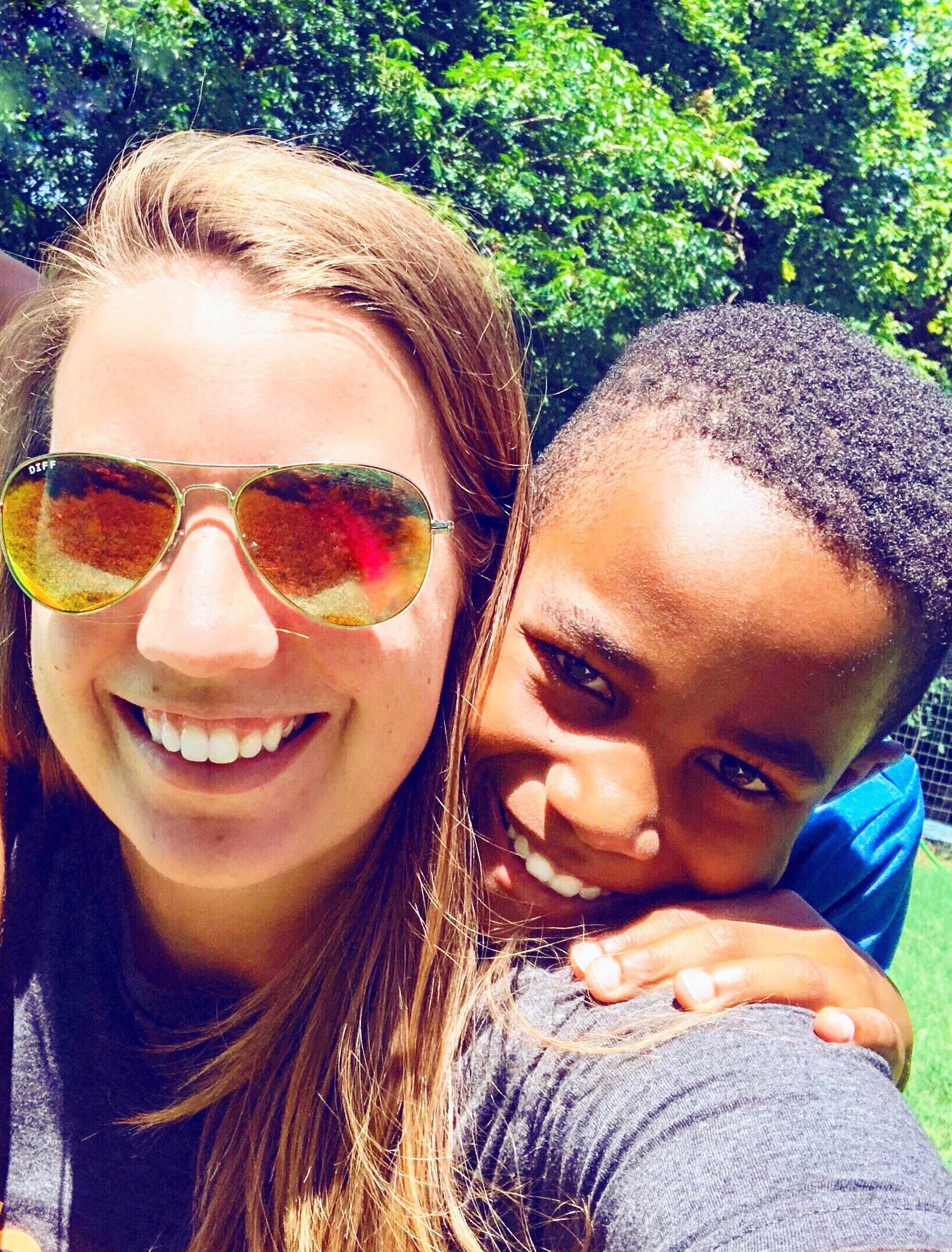 AJ and Kelly together outside in front of a barn